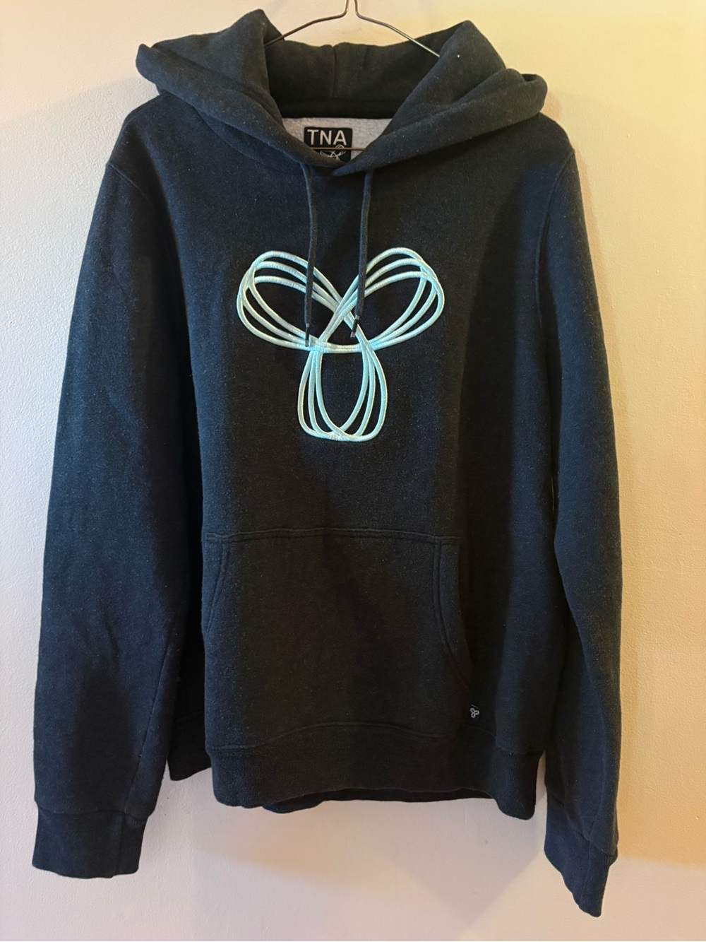 Aritzia TNA Baltic Pullover Hoodie Black Teal Embroidered Spiro Logo Size XL.